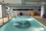 Marina Club Lagos Resort espaço de spa com piscina interior em Lagos