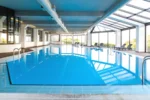 Meliá Castelo Branco espaço de spa com piscina interior em Castelo Branco