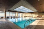 Piscina interior e spa privativo em Espinho Exe Praia Golfe